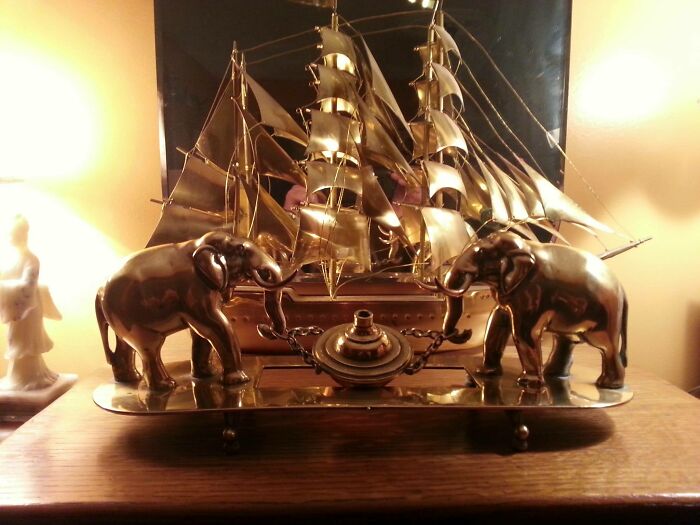 Brass vintage secondhand lamp with elephant figures and ship sculpture centerpiece