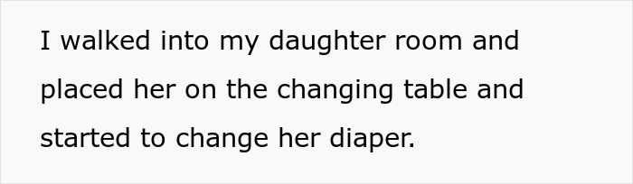 A person changes a baby's diaper on a changing table. This mundane task can be impacted by postpartum challenges.