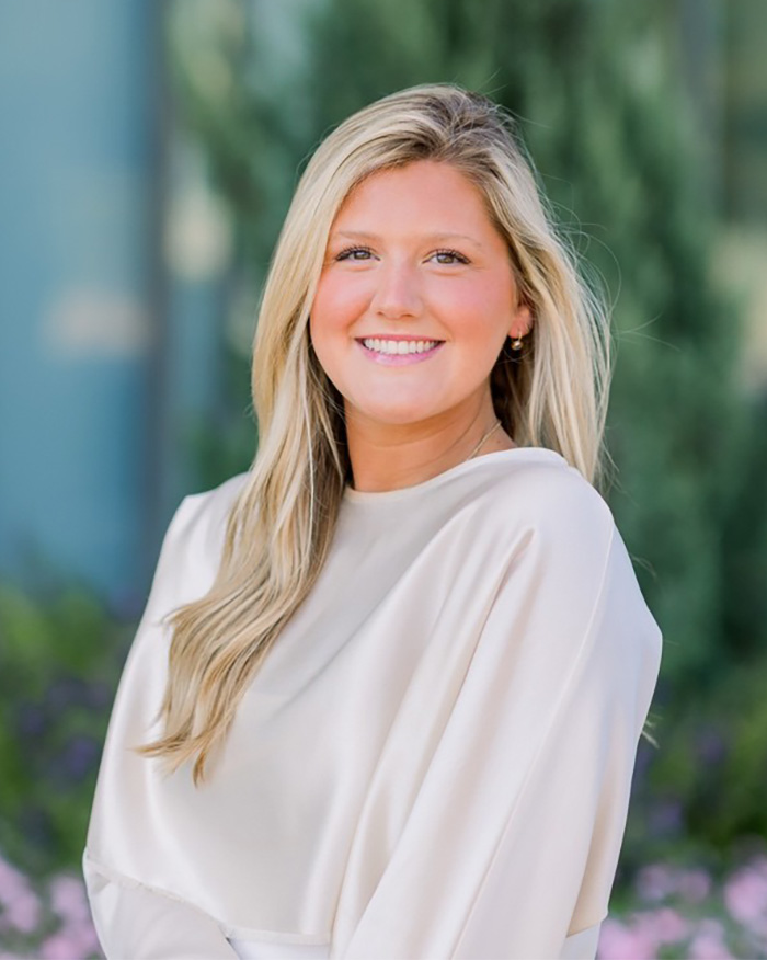 Young blonde woman smiling outdoors portrait haunting autopsy