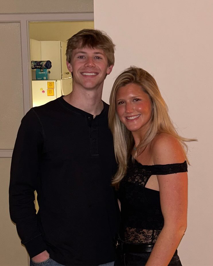 Young couple smiling indoors portrait haunting autopsy