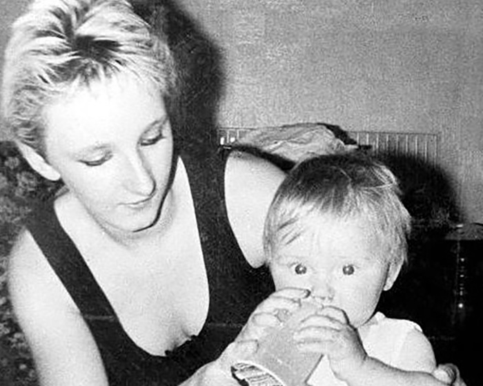 Black and white photo of mother with toddler missing child