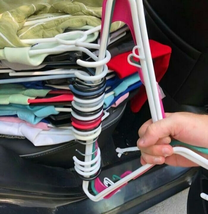 Smart creative solution for hanging multiple clothes hangers together