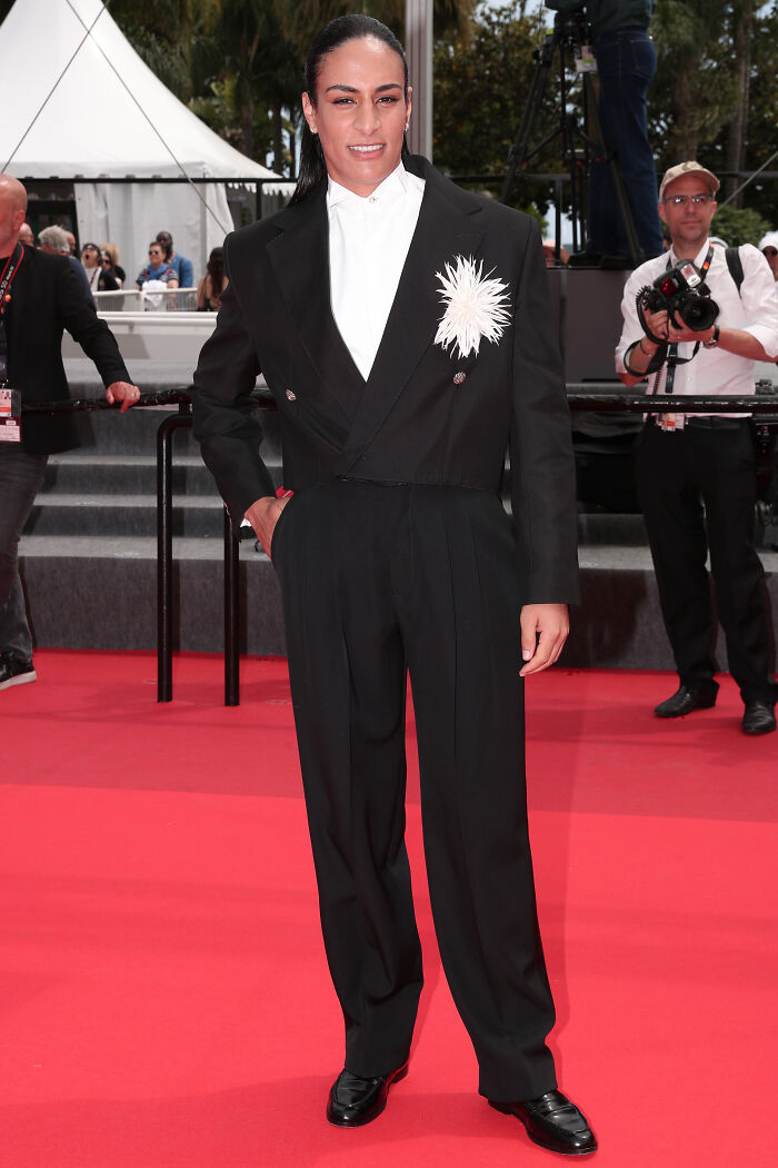 Cannes 2026 red carpet black suit with floral brooch fashion fail