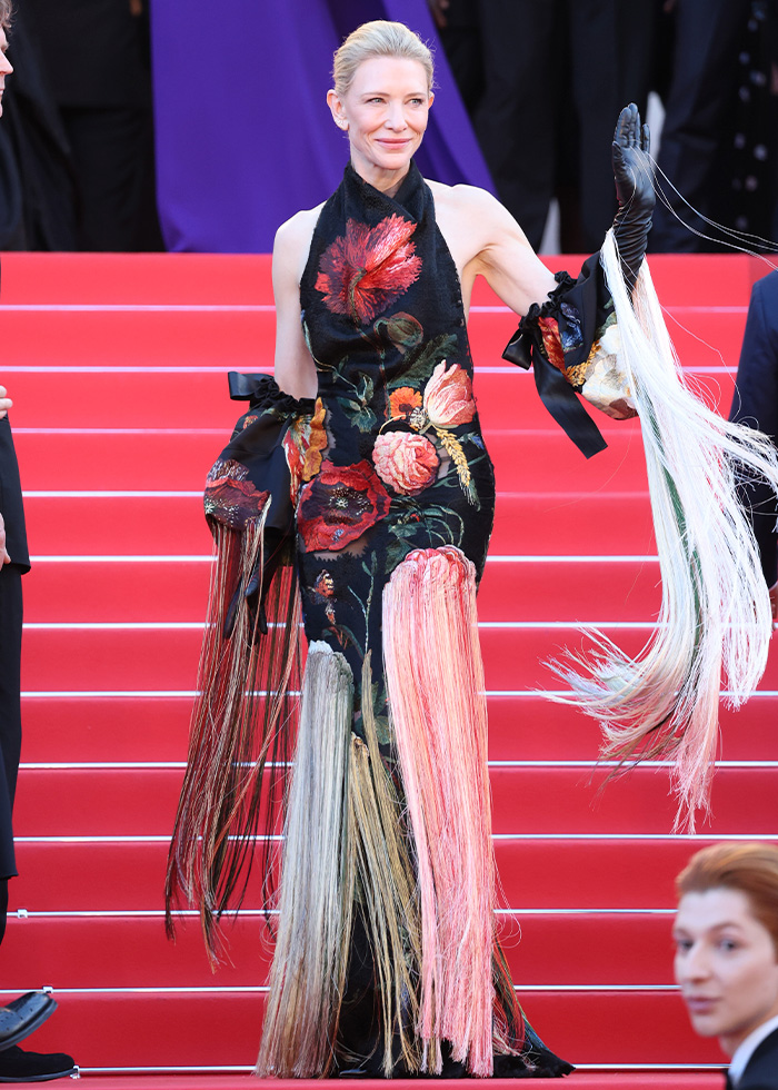Cannes 2026 red carpet floral dress with long fringe fashion fail