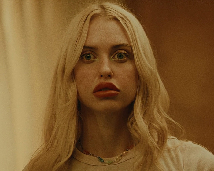 Portrait of Chloe Cherry emphasizing altered lips after filler