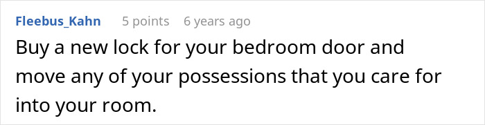 A Reddit comment from Fleebus_Kahn suggesting a new lock for a bedroom door to defend herself against a roommate.