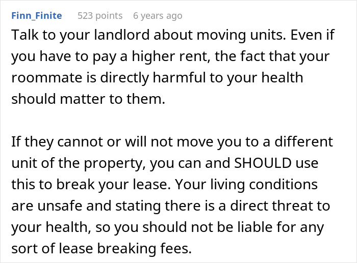 A screenshot of a Reddit comment advising a woman to defend herself by talking to her landlord about a harmful roommate.