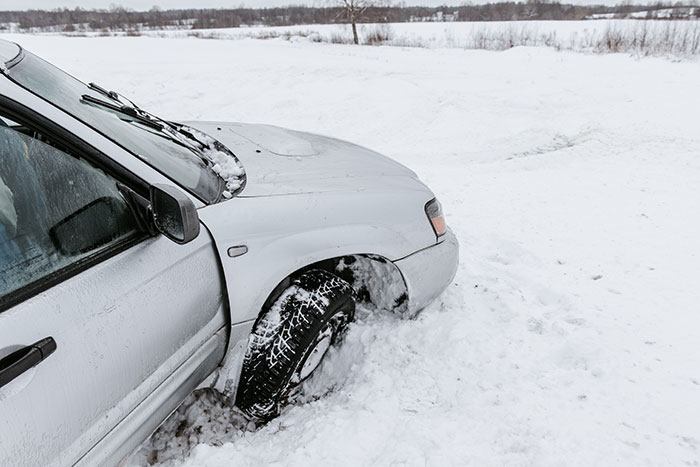 Car stuck in snow visualizing creepy things women have done to men