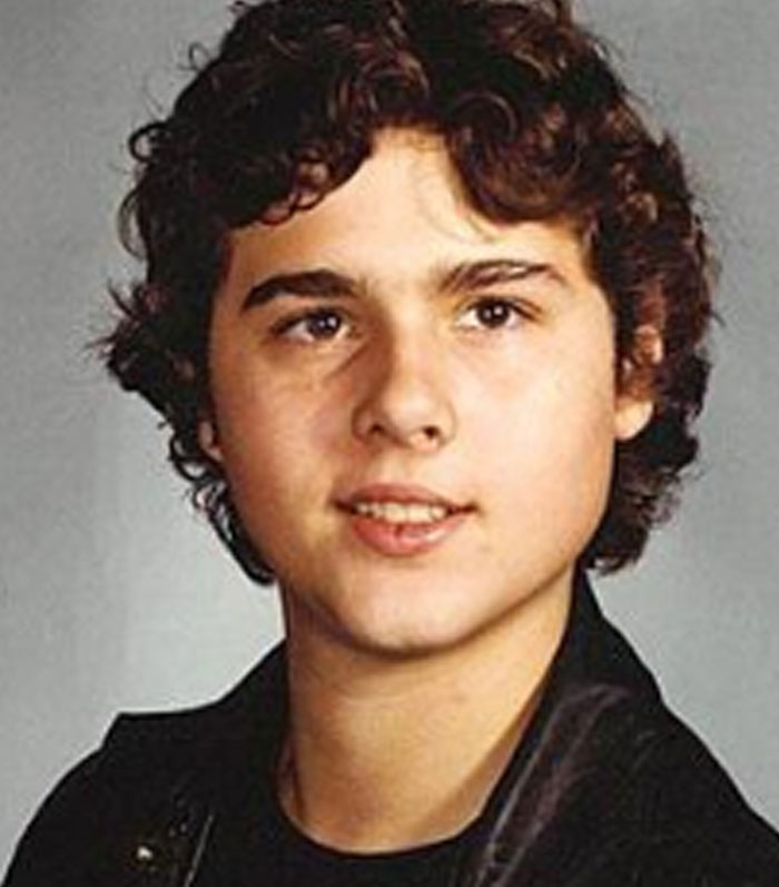 Color portrait of young man with curly hair linked to dark Wikipedia rabbit holes