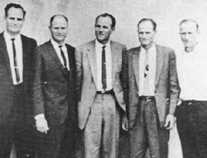 Vintage photo of men in suits representing dark Wikipedia rabbit holes