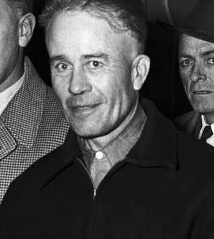 Black and white photo of a man linked to shocking facts about serial killers