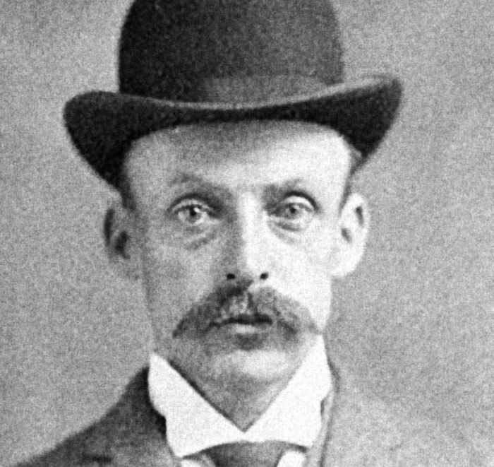 Vintage portrait of a man in top hat related to serial killers facts