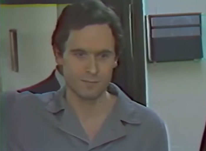 Serial killer in casual clothing leaving a building