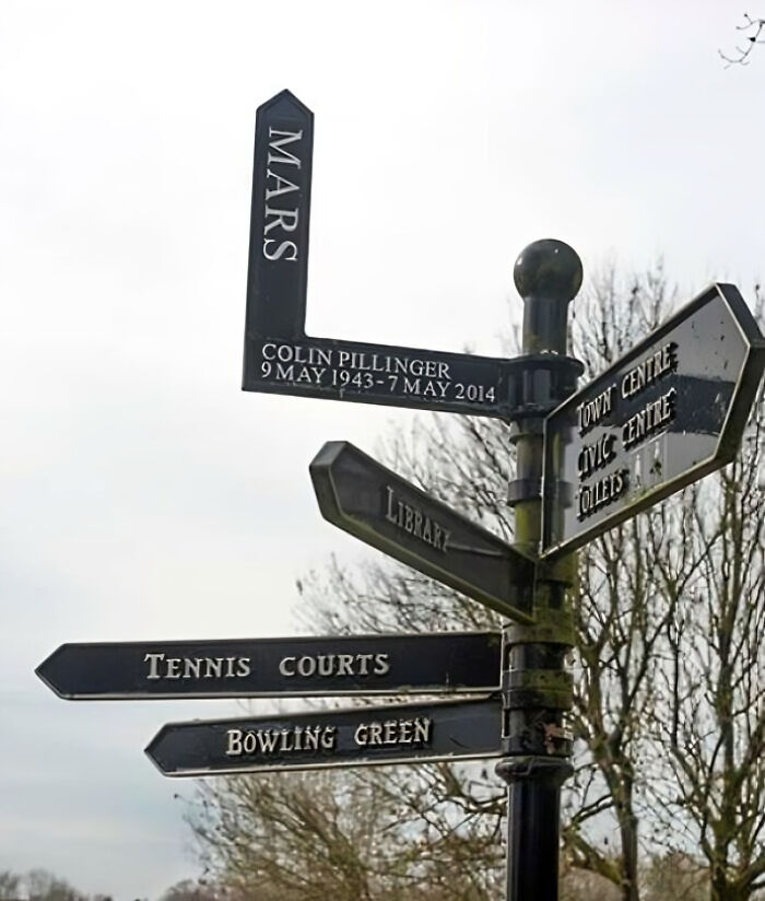 Funny British directional signpost with a Mars reference