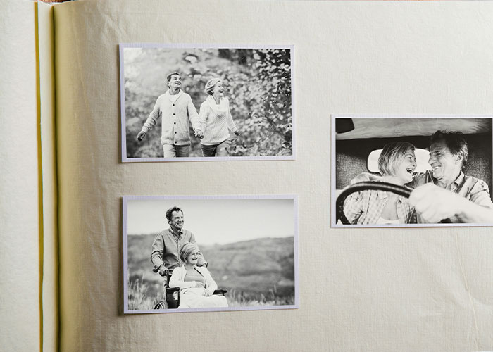 Vintage family photos in black and white displayed in an album