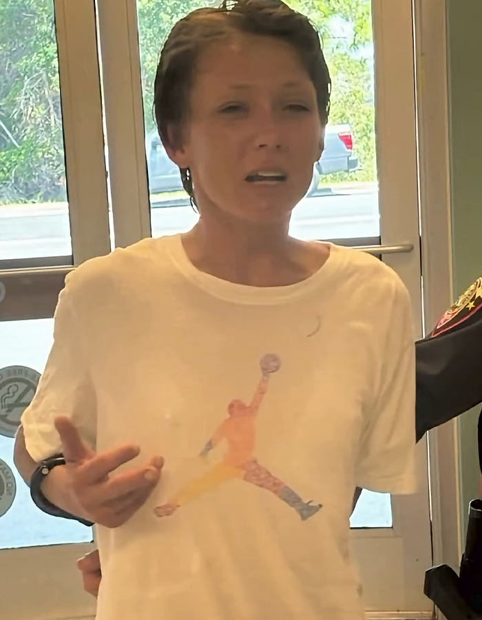 Dog Owner Fakes Heart Attack As She's Arrested After Pets Horrifically Attack Woman In Front Of Husband