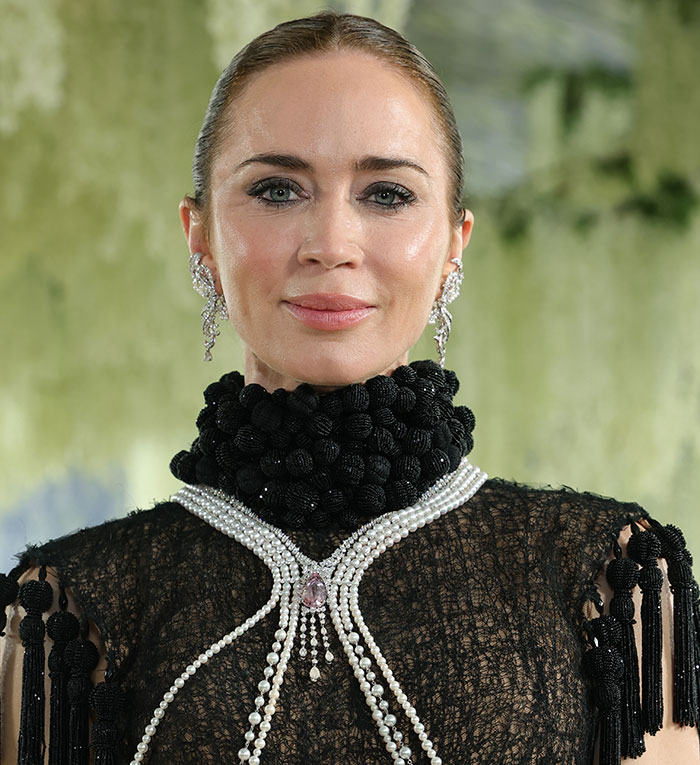 Met Gala 2026: A star's close-up in a black beaded gown and pearls, showing off potential plastic surgery.