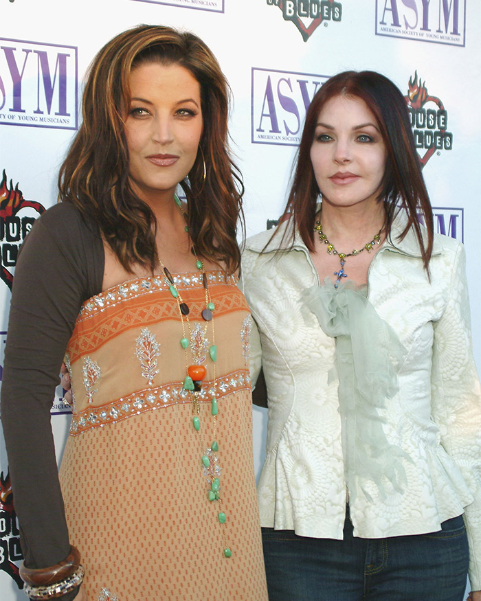 Lisa Marie Presley and Priscilla Presley posing. Fans question Priscilla Presley after daughter Lisa Marie's passing.