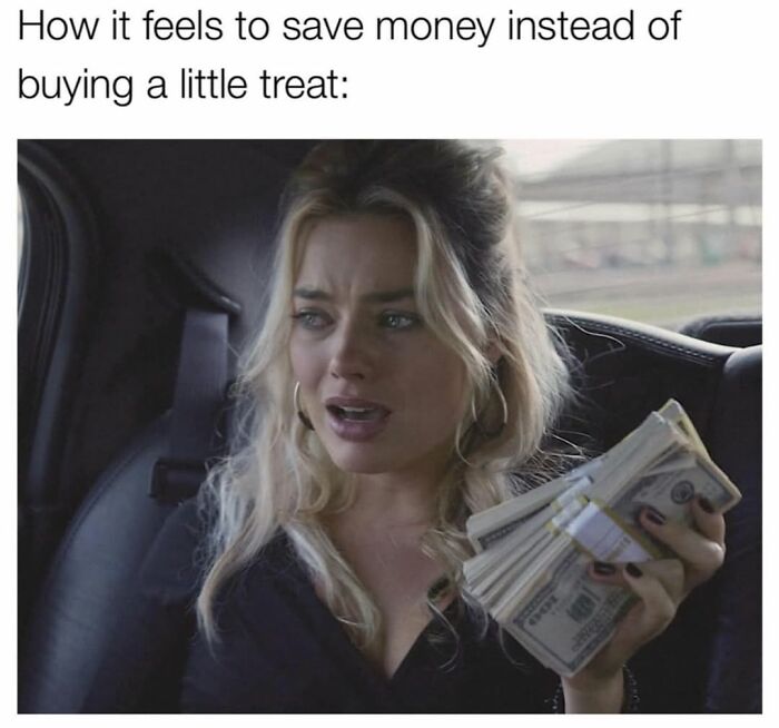 Woman holding cash showing feeling of saving money meme