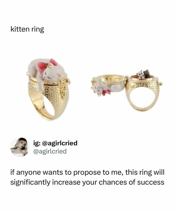 Gold kitten ring with cat sleeping on top and inside