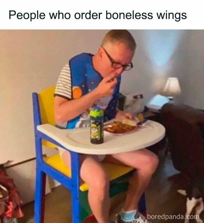 Man eating boneless wings while sitting in a colorful kids chair meme
