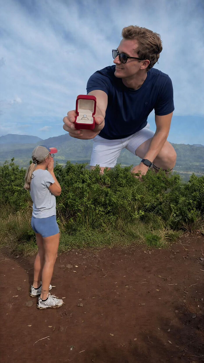 A giant man proposes to a woman with a ring, a viral proposal pic with many hilarious edits.