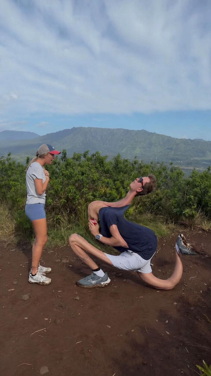 A woman watches her distorted partner, who appears to be proposing. This proposal pic has inspired many hilarious edits.