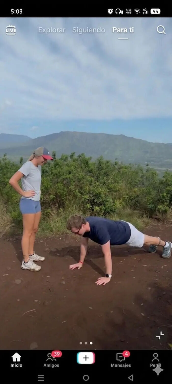 Woman's proposal pic, showing a man proposing in a push-up position, creating hilarious edits.
