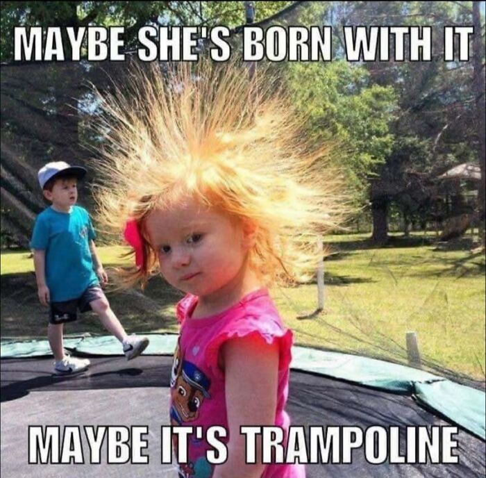 A little girl with static-charged, spiky blonde hair on a trampoline. A funny random meme to make you laugh.