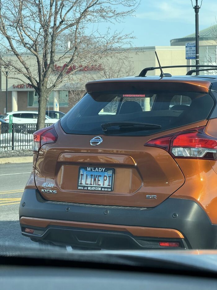 Photo of car with I LIKE PI license plate science math humor