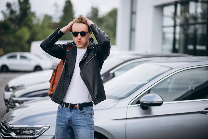 Man shocked by unexpected disaster near parked cars outside building