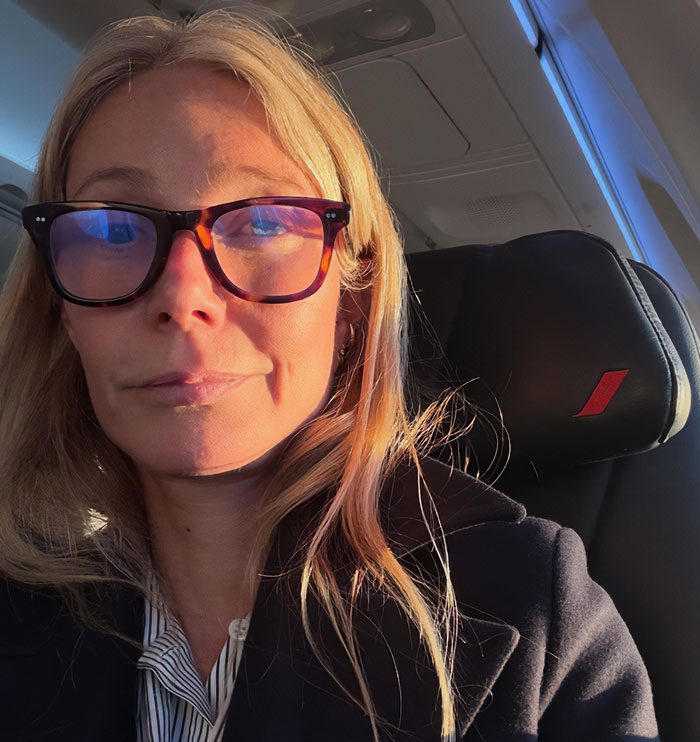 Gwyneth Paltrow selfie wearing glasses on airplane in natural light Gwyneth Paltrow selfie wearing glasses on airplane in natural light