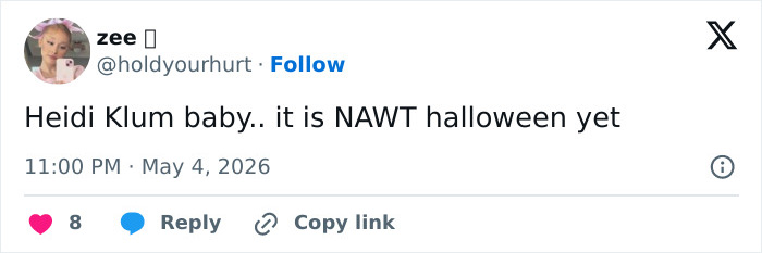A tweet about Heidi Klum's Met Gala outfit, mocking her transformation and stating it is not Halloween yet.
