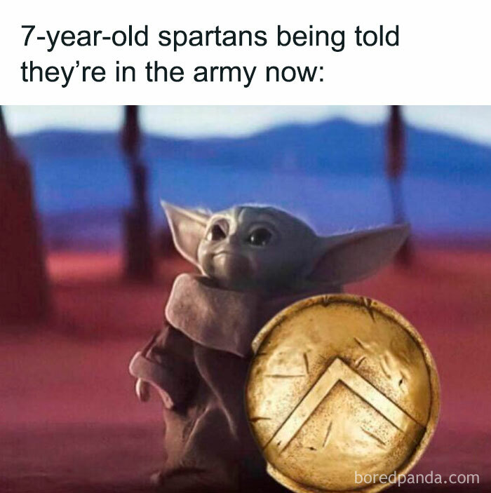 A funny history meme of Grogu (Baby Yoda) holding a Spartan shield, looking resolute, depicting young Spartans in the army.