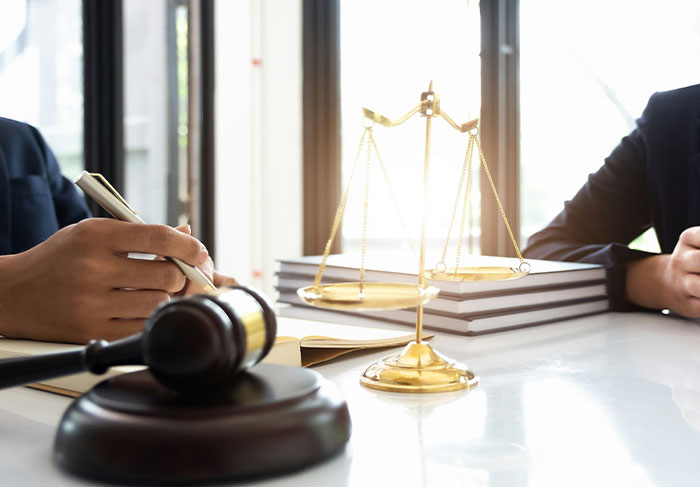 Legal gavel and scales of justice symbolizing landlord tenant court case