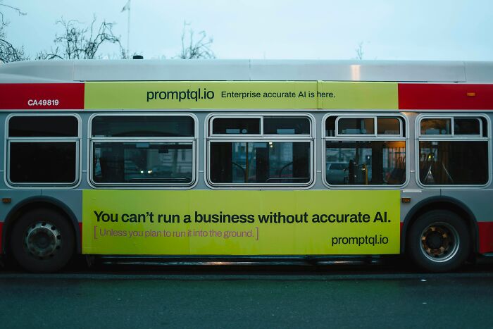 Bus advertisement emphasizing the need for accurate AI in business operations
