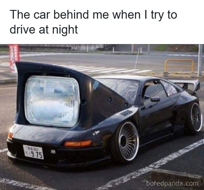 Funny car meme with headlight shaped like a giant rearview mirror driving at night