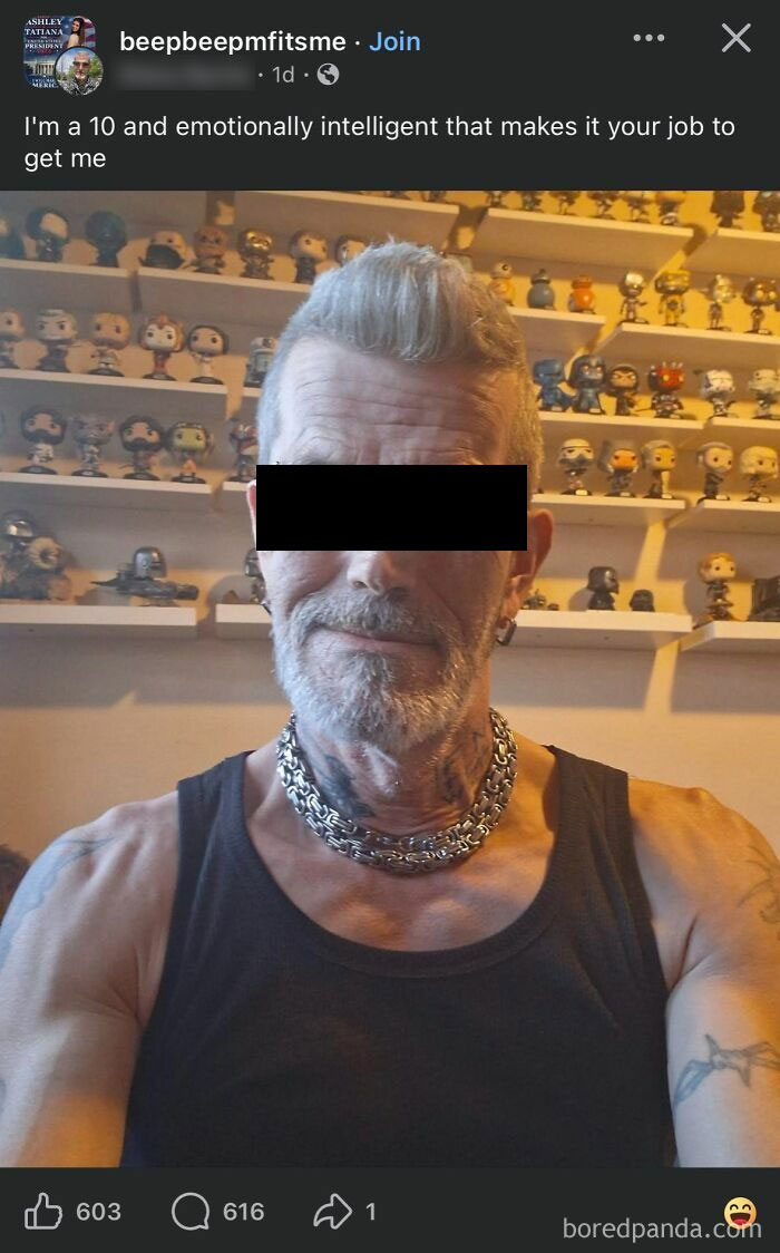 Man with tattoos and chain necklace posing in front of shelves full of collectible figurines