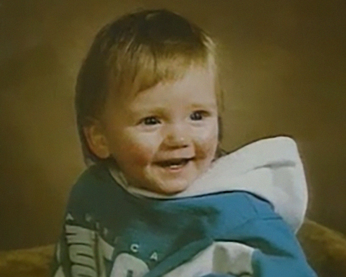 Missing child smiling in toddler photo