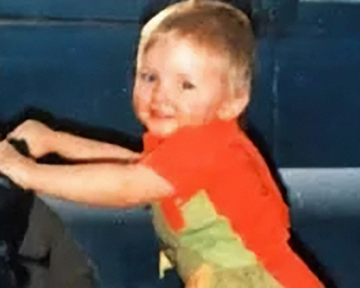 Missing child playing in candid photo