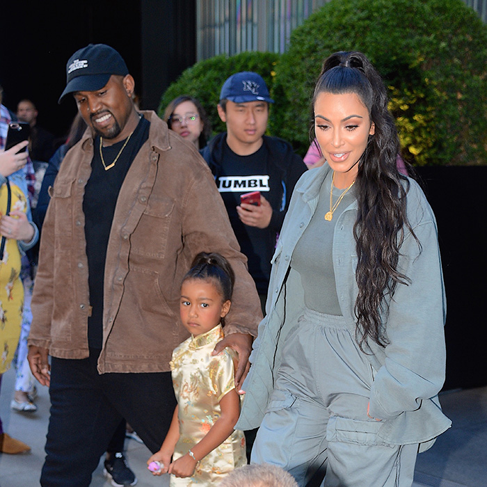 Kim Kardashian with family at a public event Kim Kardashian with family at a public event