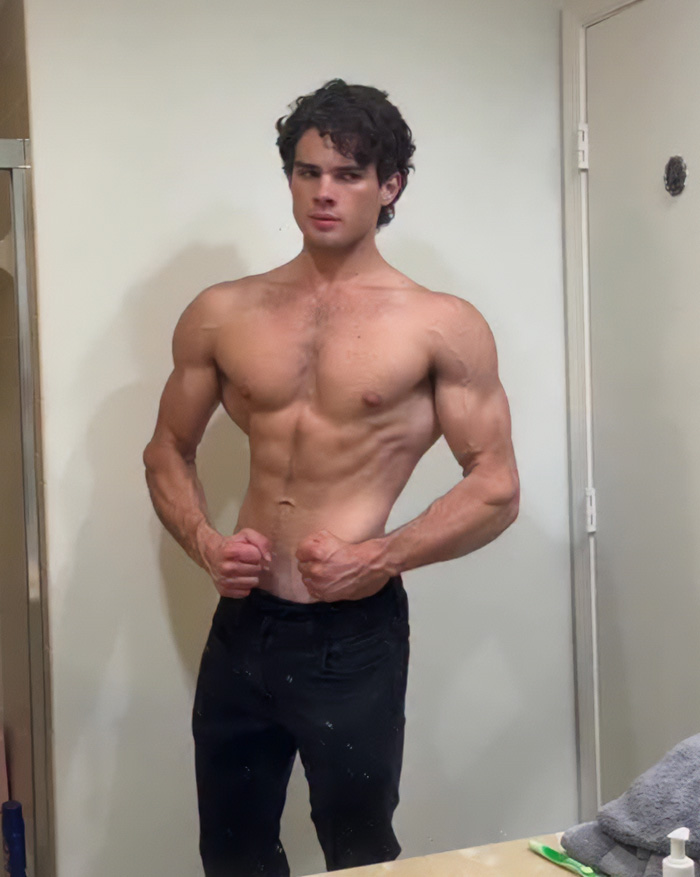 Shirtless muscular man showcasing looksmaxxing transformation after quitting testosterone Shirtless muscular man showcasing looksmaxxing transformation after quitting testosterone