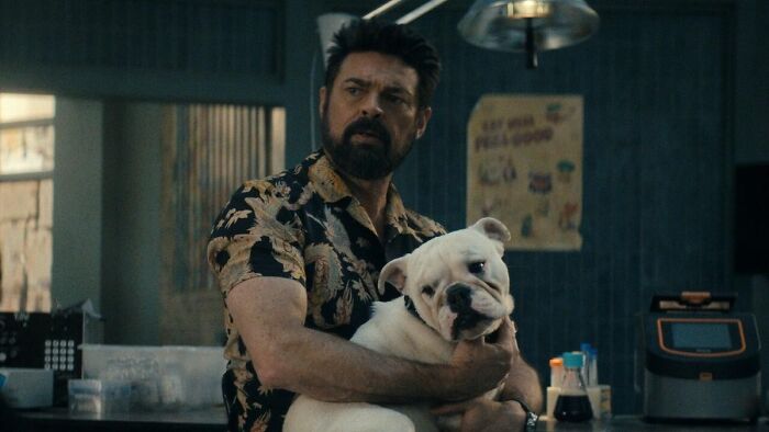 Billy Butcher holding a dog in The Boys Finale, exploring character's fate.