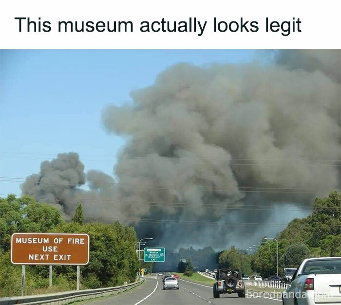 Funny fire museum road sign with smoke resembling fire for ridiculous memes