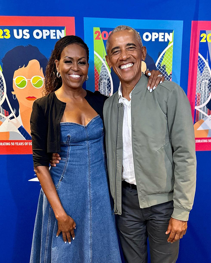 Michelle Obama and Barack Obama smiling at US Open event