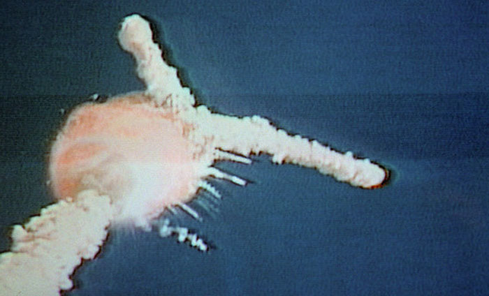 Historic powerful photo of a space shuttle explosion in midair