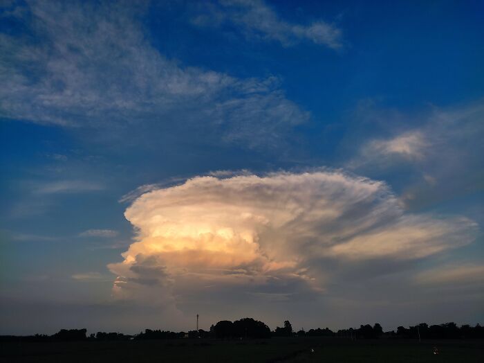 Large cloud formation against blue sky in incredible nature photo