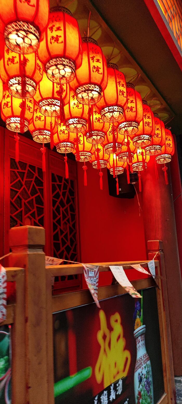 Bright red Chinese lanterns hanging in vivid photo