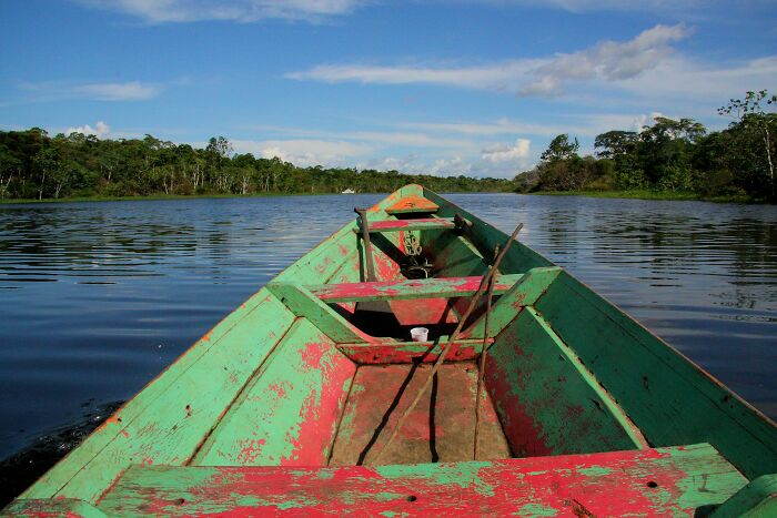 View from a boat on a river depicting fascinating travel and exploration facts