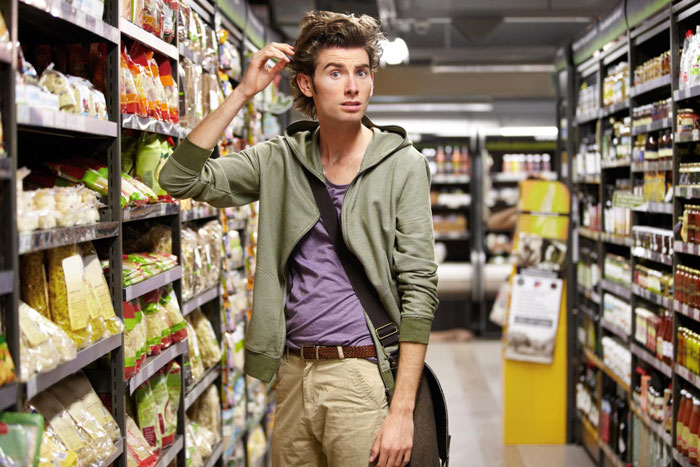 A funny image of a man looking confused in a grocery aisle, potentially related to the neighbor running stalker story. A funny image of a man looking confused in a grocery aisle, potentially related to the neighbor running stalker story.